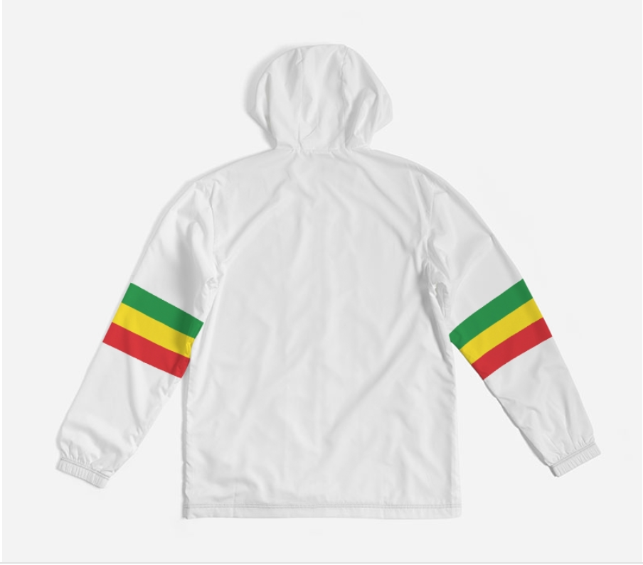 White hooded windbreaker jacket shown from the back, featuring green, yellow, and red striped sleeve bands on both arms, photographed on a light gray background.