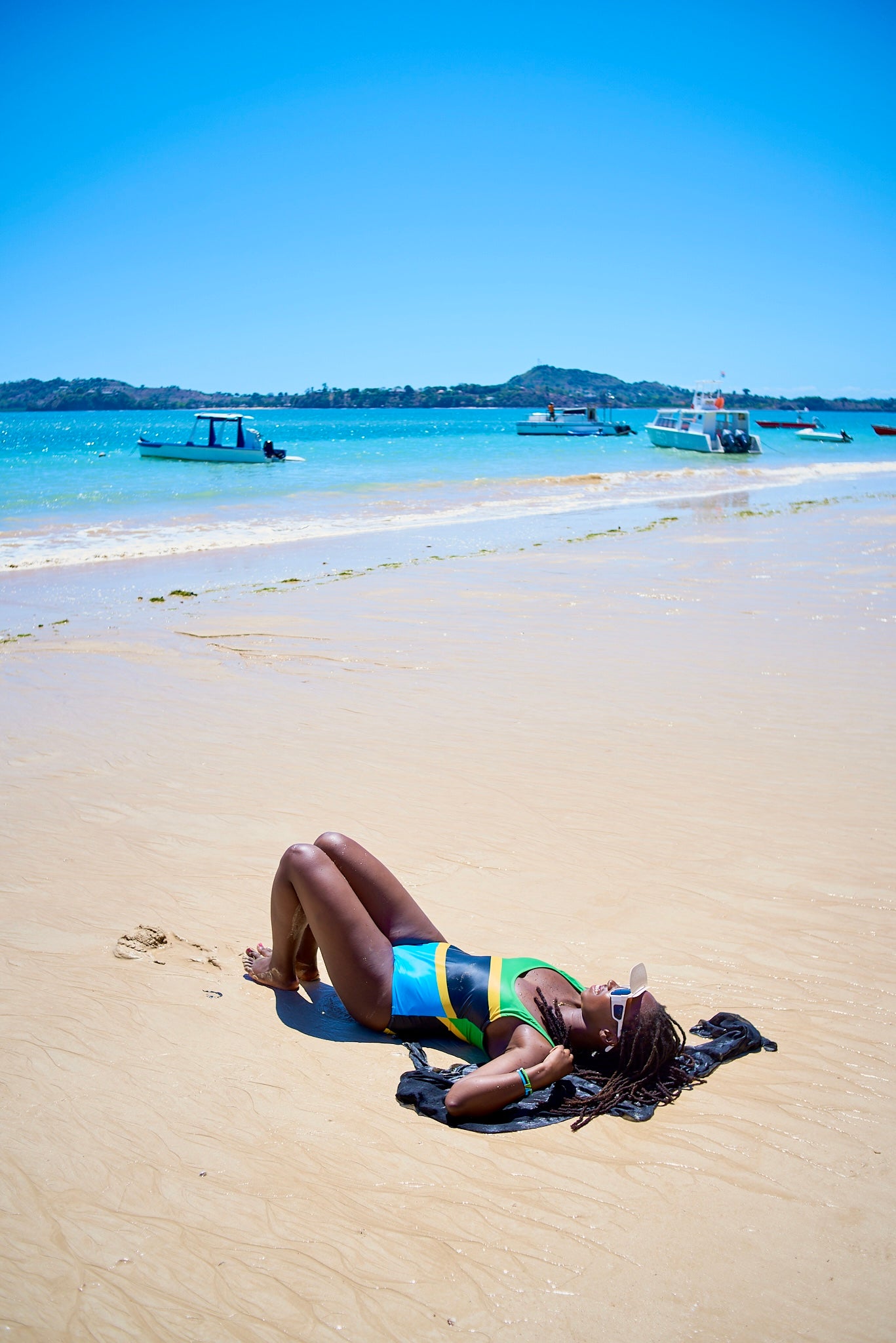 Front view of women's one-piece swimsuit inspired by the Tanzania 