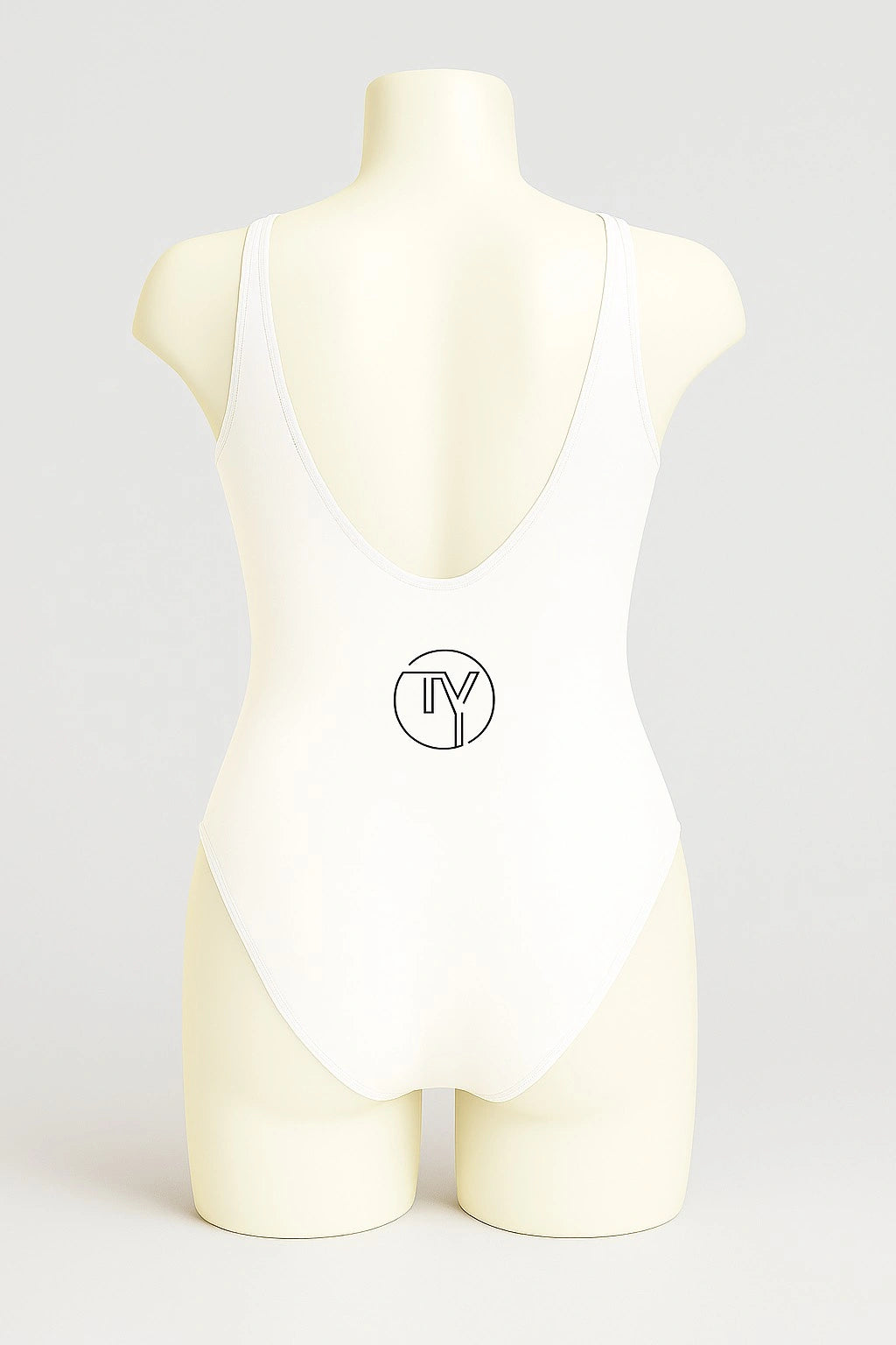 Back view of women's one-piece swimsuit in white with black TY logo with map of  Eritrea